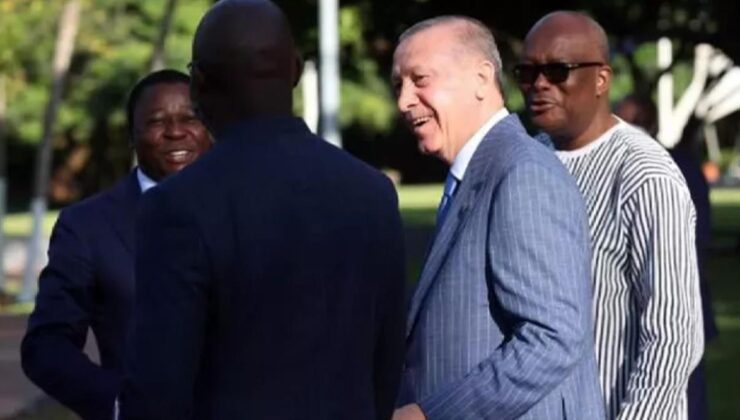 erdoğan, kahkaha attığı fotoğrafın perde arkasını anlattı: eski futbolcu weah ile bir espri üzerine gülümsedik