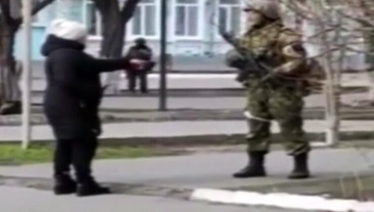 ukraynalı kadından rus askere: silahları bombaları bırakın